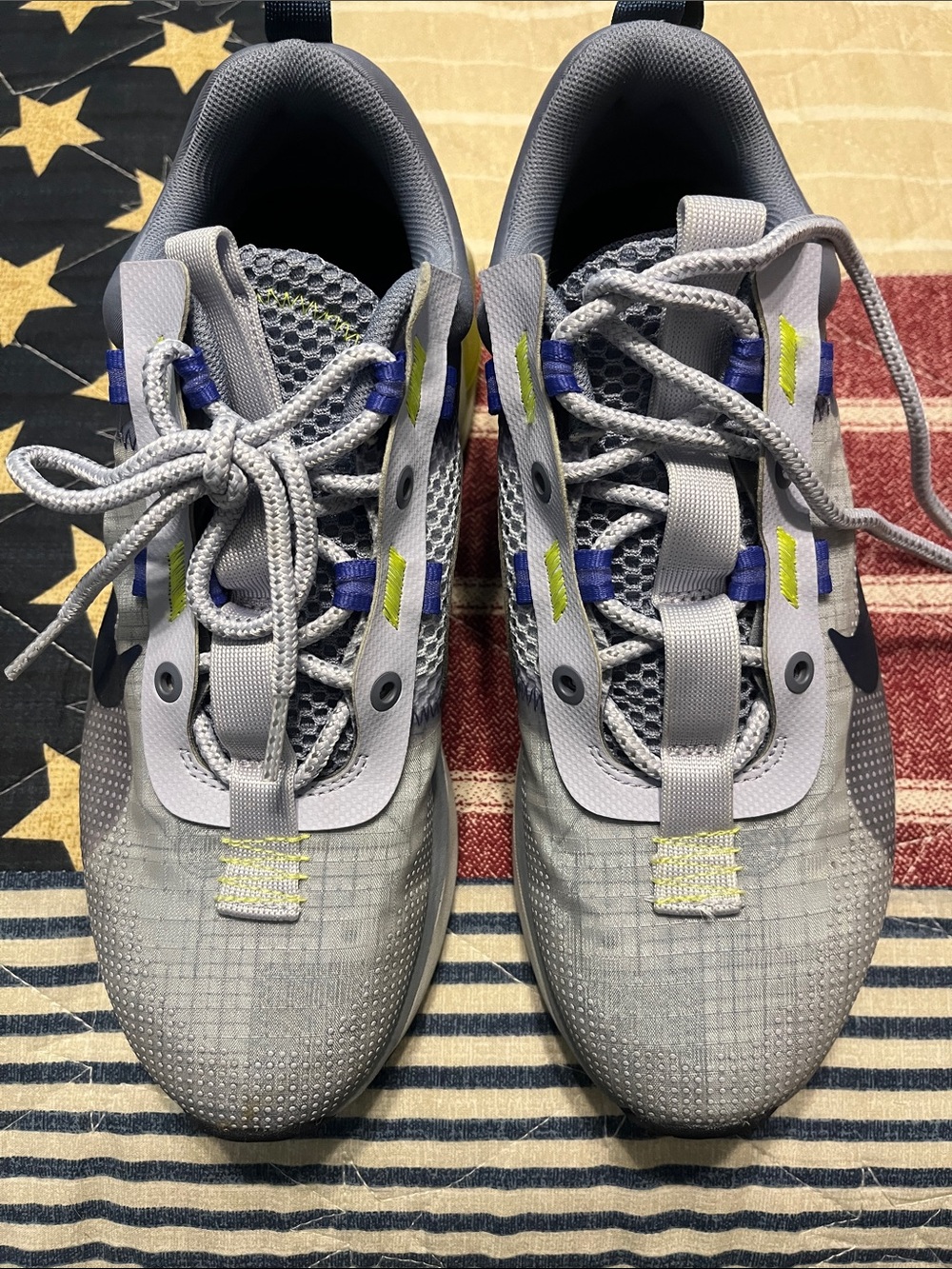 Nike Gray Sneakers with Blue & Yellow Accents